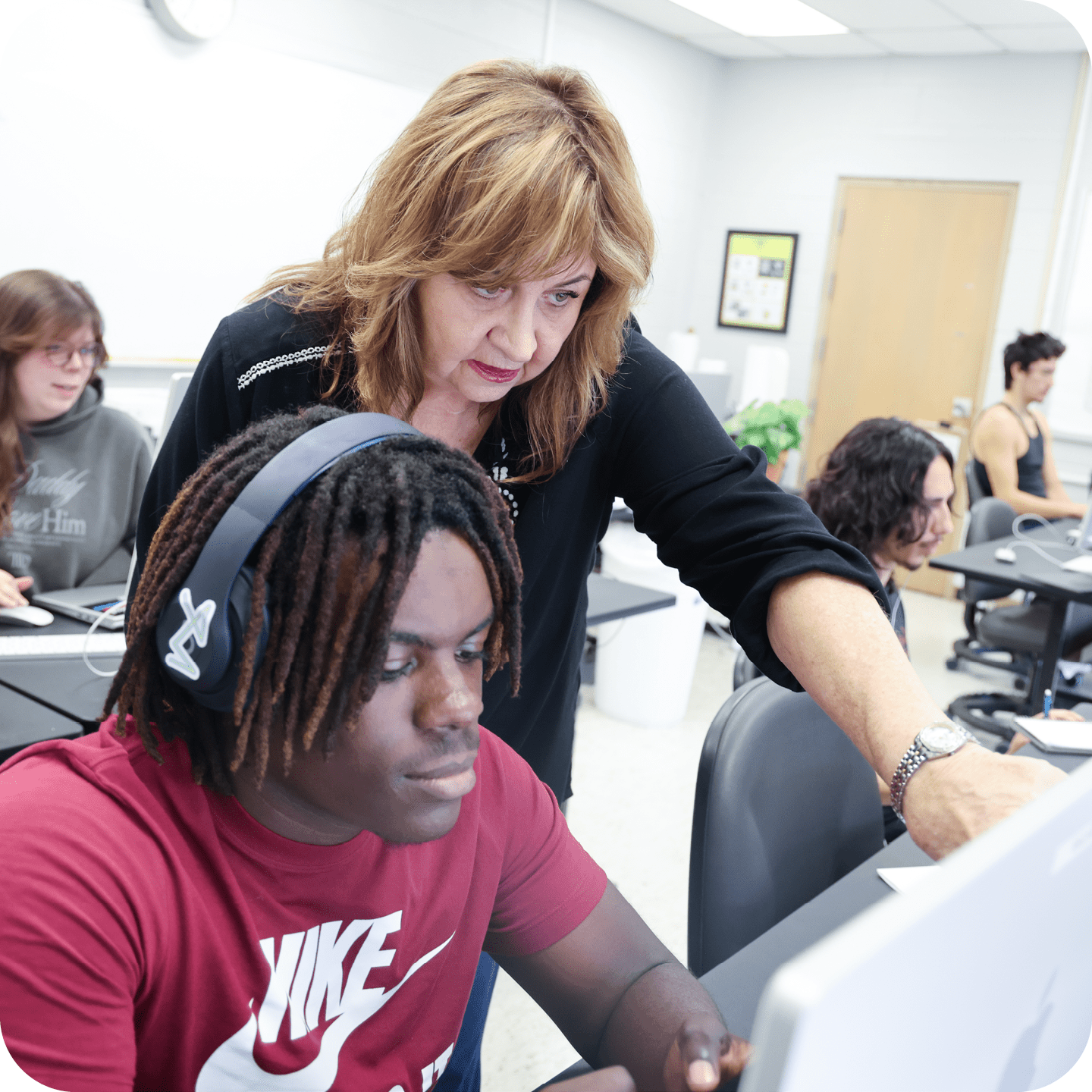 McMurry University — professor working with student